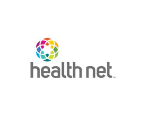 Logo for Health Net featuring a colorful, circular design above the company name in gray lowercase letters on a white background.